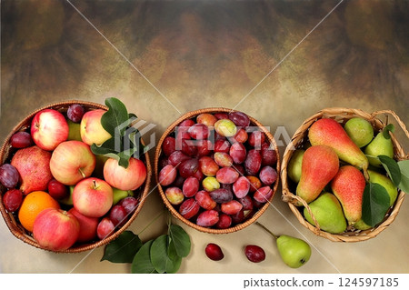Apples, pears and plums in baskets on a sunny wooden table, thanksgiving background, village harvest, healthy natural food concept, detox diet and body cleansing, screen banner, cafe, restaurant, 124597185
