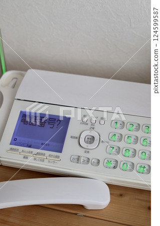 Old and dirty landline phone with fax machine, push button phone Old and dirty landline phone with fax machine, push button phone 124599587