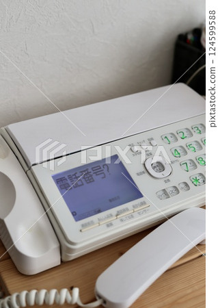 Old and dirty landline phone with fax machine, push button phone Old and dirty landline phone with fax machine, push button phone 124599588
