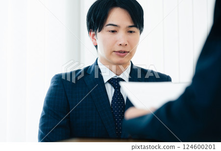 Businessman getting nervous during an interview 124600201
