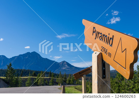 Pyramid Mountain Signpost in Jasper National Park. Canadian Rockies summer landscape. Alberta, Canada Pyramid Mountain Signpost in Jasper National Park. Canadian Rockies summer landscape. Alberta, Canada 124600263