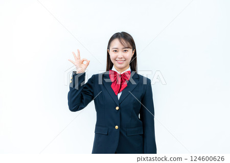School girl playing OK School girl playing OK 124600626