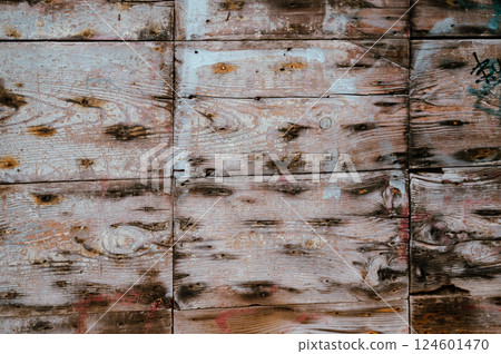 old wooden boards on the wall with black nail stains. used as a background. High quality photo old wooden boards on the wall with black nail stains. used as a background. High quality photo 124601470