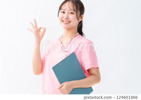 Young doctor making an OK pose 124601866