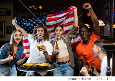 Man and woman drinking alcohol and having conversation on party in nightclub 124602179
