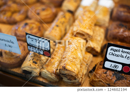 Croissants, rolls with cheese and chocolate filling are in show case of food court 124602194