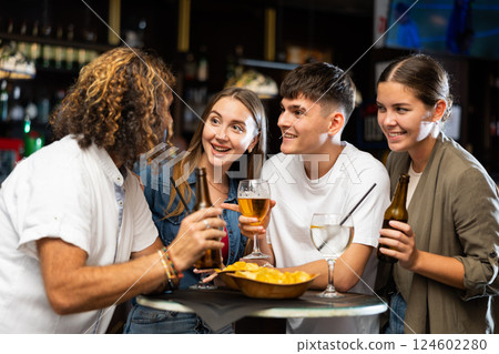 Friendly people spending time in pub 124602280