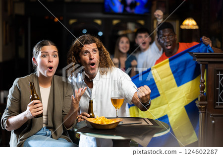Sweden football team fans spending time in bar 124602287