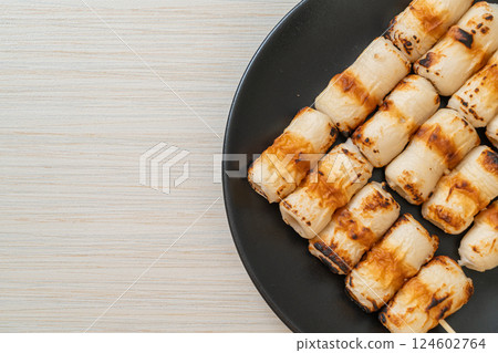 grilled tube shaped fish paste cake skewe or tube squid skewer 124602764
