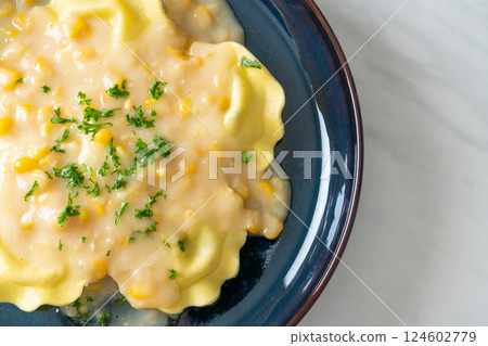 ravioli pasta with corn cheese sauce 124602779