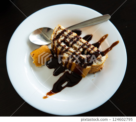 Spanish sweet dessert Brazo de Gitano with filling of nutella Spanish sweet dessert Brazo de Gitano with filling of nutella 124602795