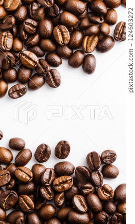 Floating coffee beans on white background create dynamic scene 124603272