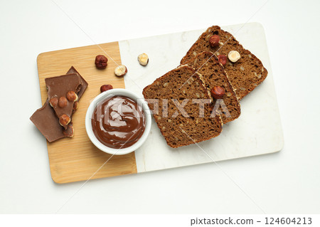 Morning food concept - tasty bread with chocolate pasta Morning food concept - tasty bread with chocolate pasta 124604213