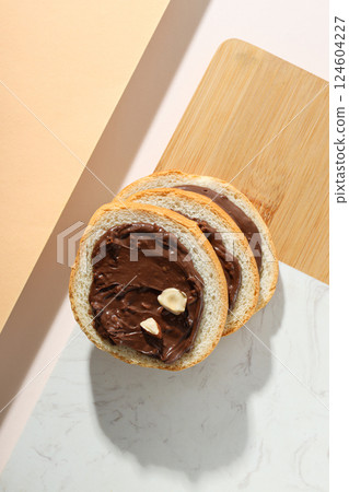 Bread with chocolate paste - tasty breakfast food 124604227
