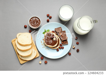 Bread with chocolate paste - tasty breakfast or morning food 124604233