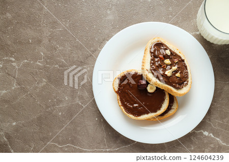 Bread with chocolate paste - tasty breakfast or morning food 124604239