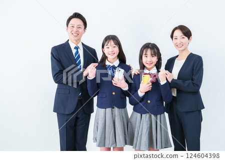 A girl posing with a smartphone 124604398