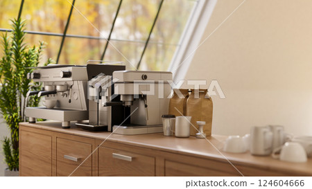 Close up of a wooden counter bar with coffee machine and coffee bean bags under large roof window. 124604666