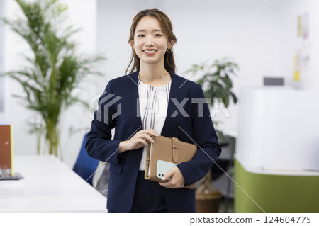 Business woman working in office 124604775
