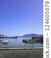 An illustration of a small port waiting for a ferry to a remote island in the Seto Inland Sea 124605078