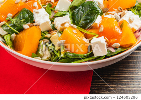 Chicken salad with feta, spinach, and fresh veggies in a bowl 124605296