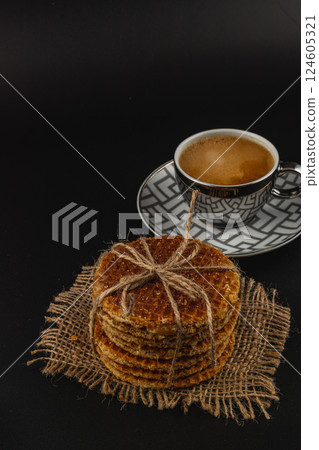 Delight in caramel waffles paired with coffee for national caramel day 124605321