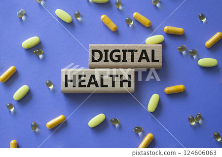 Digital Health symbol. Concept word Digital Health on wooden blocks. Beautiful purple background with pills. Medicine and Digital Health concept. Copy space 124606063