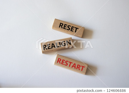 Reset Realign Restart symbol. Concept words Reset Realign Restart on wooden blocks. Beautiful white background. Business and Reset Realign Restart concept. Copy space. 124606886
