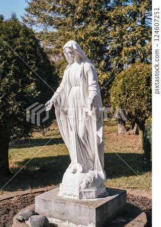 Virgin Mary statue in Christian Catholic church. Religion, Christianity, Catholicism concept 124607251
