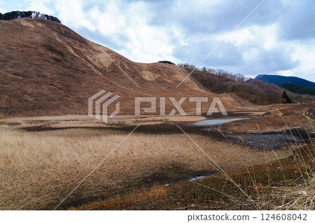 Soni Plateau before it was covered in fresh greenery after the mountain burn. Okame Pond seen from the square at the back of the plateau. 124608042