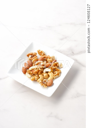 Nutritious and healthy mixed nuts assortment 124608127