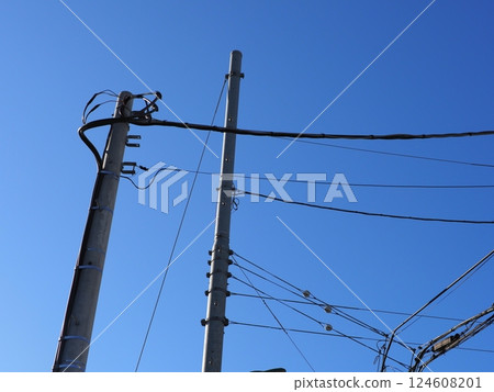 A refreshing blue sky and a utility pole A refreshing blue sky and a utility pole 124608201