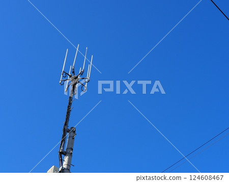 The railroad tracks continue. Electric wires and sky. The blue sky feels good. Copy space. The railroad tracks continue. Electric wires and sky. The blue sky feels good. Copy space. 124608467