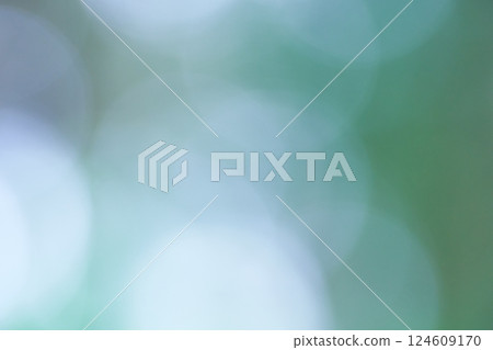 Background image of large white polka dots on green background Background image of large white polka dots on green background 124609170