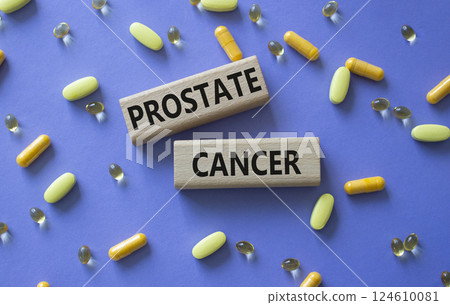 Prostate Cancer symbol. Concept word Prostate Cancer on wooden blocks. Beautiful purple background with pills. Medicine and Prostate Cancer concept. Copy space 124610081