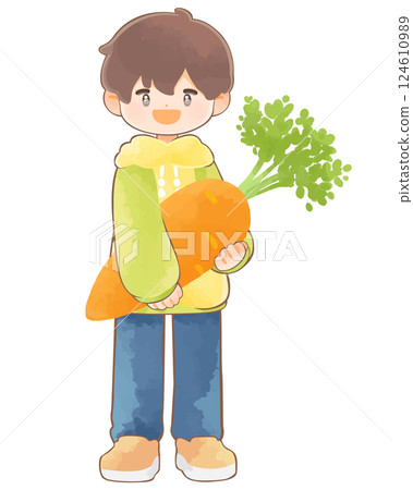 蔬菜和孩子：一個男孩拿著一根大胡蘿蔔 124610989