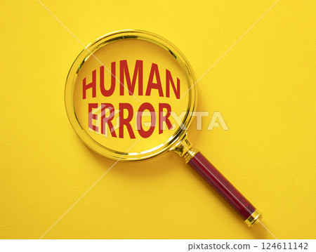 Human Error symbol. Magnifying glass with words Human Error. Beautiful yellow background. Business and Human Error concept. Copy space. 124611142