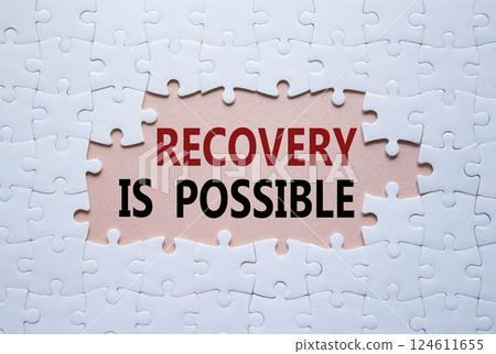 Recovery is possible symbol. Concept words Recovery is possible on white puzzle. Beautiful pink background. Business and Recovery is possible concept. Copy space. 124611655