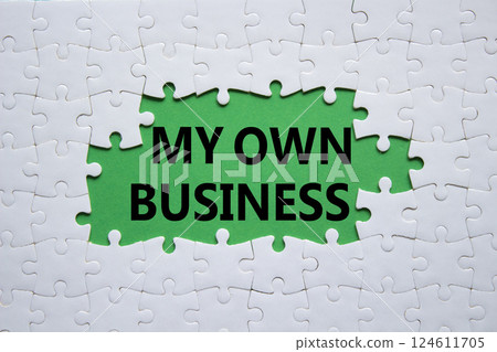 My own Business symbol. Concept words My own Business on white puzzle. Beautiful green background Business and My own Business concept. Copy space. My own Business symbol. Concept words My own Business on white puzzle. Beautiful green background Business and My own Business concept. Copy space. 124611705