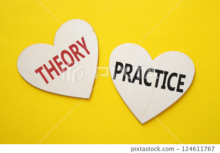 Theory or Practice symbol. Concept word Theory or Practice on wooden hearts. Beautiful yellow background. Business and Theory or Practice concept. Copy space Theory or Practice symbol. Concept word Theory or Practice on wooden hearts. Beautiful yellow background. Business and Theory or Practice concept. Copy space 124611767