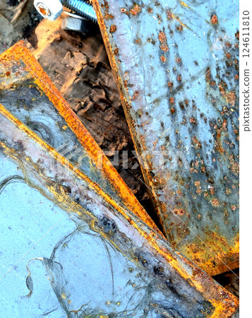 Close up of Heavily Rusted Blue Steel Metal Plate with Orange corrosion Close Up Background Close up of Heavily Rusted Blue Steel Metal Plate with Orange corrosion Close Up Background 124611810