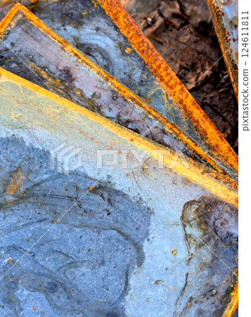 Close up of Heavily Rusted Blue Steel Metal Plate with Orange corrosion Close Up Background Close up of Heavily Rusted Blue Steel Metal Plate with Orange corrosion Close Up Background 124611811