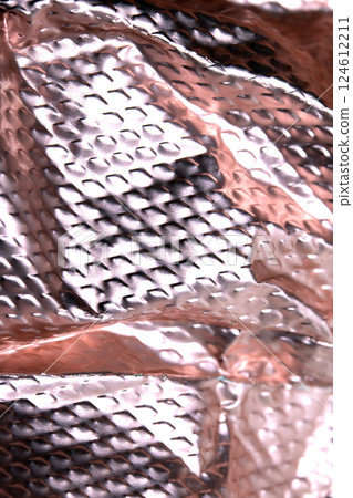 Industrial foil shiny background with rivets and crumpled lines 124612211