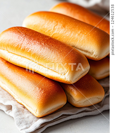 Wheat bread. baked hot dog buns on white background. AI Generated. 124612538