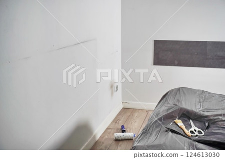 white dirty, greasy, stained walls before renovation in room. co white dirty, greasy, stained walls before renovation in room. co 124613030