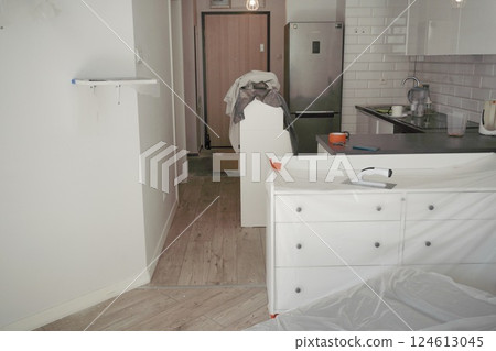 renovation, covered furniture with plastic. Apartment redecoration and home construction, renovation, covered furniture with plastic. Apartment redecoration and home construction, 124613045