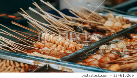 Traditional Chinese Meat Snacks On Bamboo Sticks. Fried Squid, Meat, Potato. Skewered Meat. Chinese Street Food. Street Barbecue. Asian Cuisine. Asian Street Food 124613269