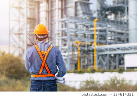 Professional Petroleum Refinery engineer man working building oil and gas power industrial plant. Professional Petroleum Refinery engineer man working building oil and gas power industrial plant. 124614321