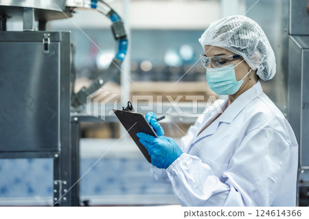 Industry inspector team working, QC staff work checking machine operation for safety and hygiene Industry inspector team working, QC staff work checking machine operation for safety and hygiene 124614366