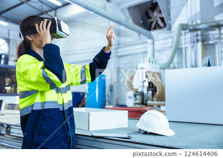 Modern Factory Innovation Technology in Industry, Technician using VR Virtual Reality Headset 124614406